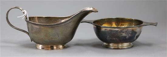 A George V silver sauceboat and a Scottish silver quaich, 8 oz.